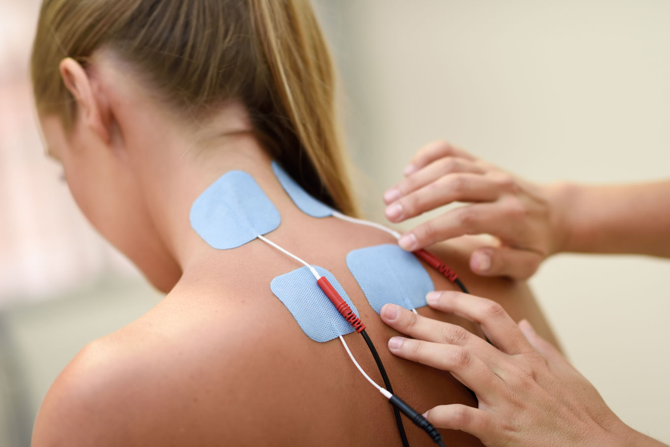 electro-stimulation-physical-therapy-young-woman